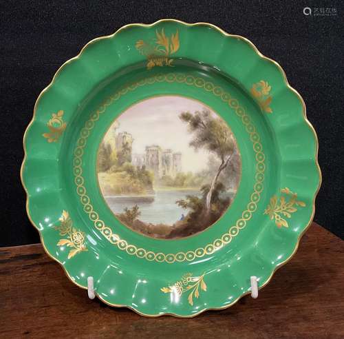 A Royal Worcester Named View wavy edged circular dish, paint...