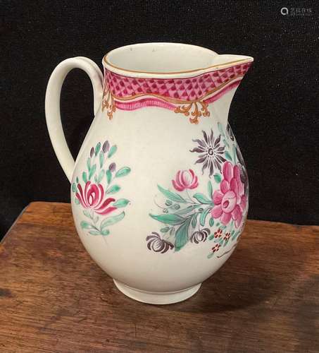 A Worcester Famille Rose sparrow beak jug, scale pink border...