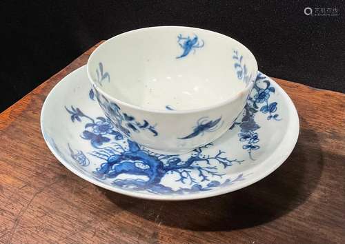 A Worcester Prunus Roots pattern tea bowl and saucer, painte...