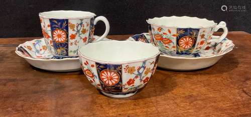 A Worcester Rich Queens pattern fluted coffee cup and saucer...