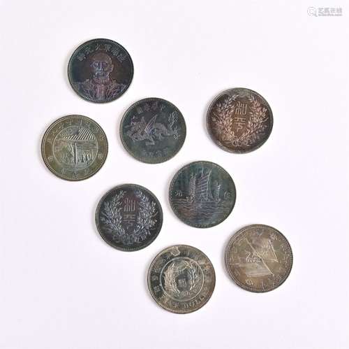 Eight coins in a group