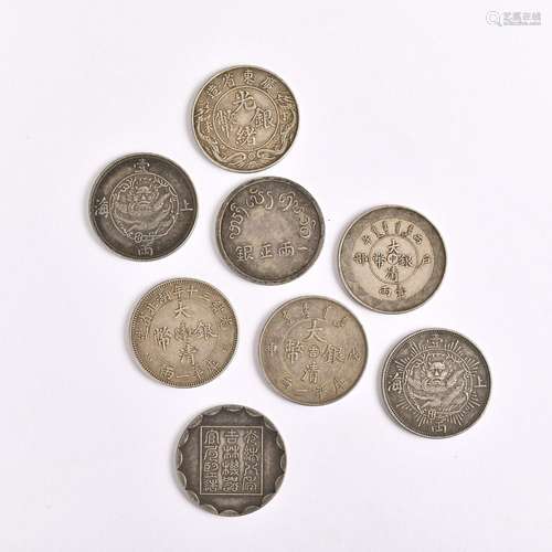 Eight coins in a group