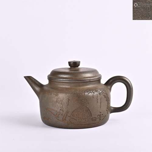 clay teapot with flower pattern