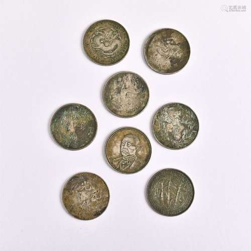 Eight coins in a group