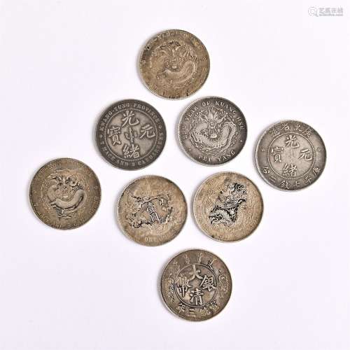 Eight coins in a group