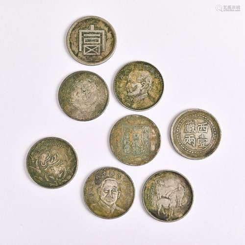 Eight coins in a group