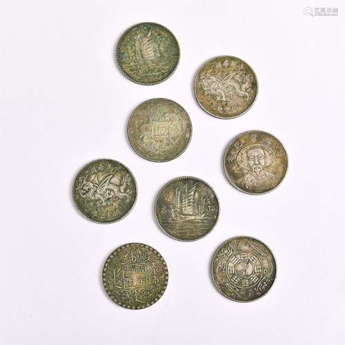 Eight coins in a group