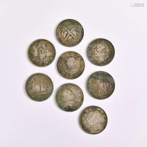 Eight coins in a group