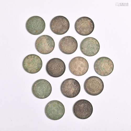 Fifteen coins in a group