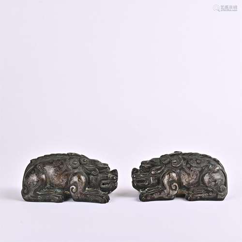 A pair of bronze auspicious animals