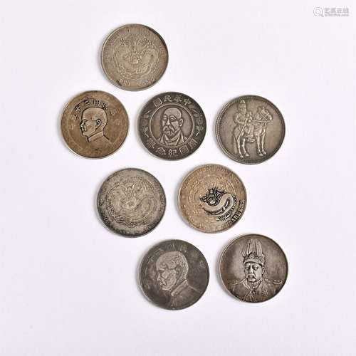 Eight coins in a group