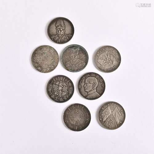 Eight coins in a group