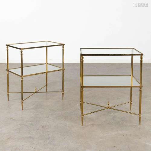 A pair of two-tier side tables, brass and glass in the style...