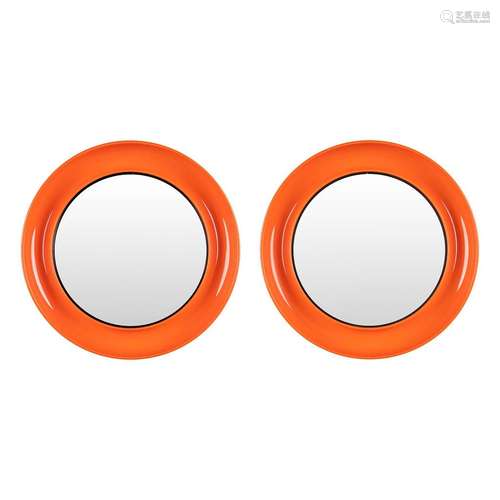 Two mid-century mirrors with an orange acrylic rim. Made in ...