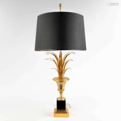 A table lamp, probably made by Boulanger S.A. Hollywood Rege...