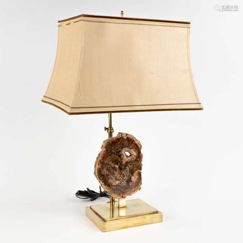 A table lamp with a fossilized tree trunk, circa 1980. (H:57...