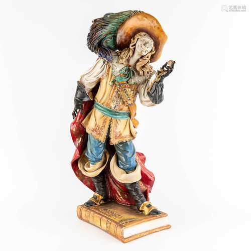 A large polychrome terracotta figurine of Cyrano De Bergerac...