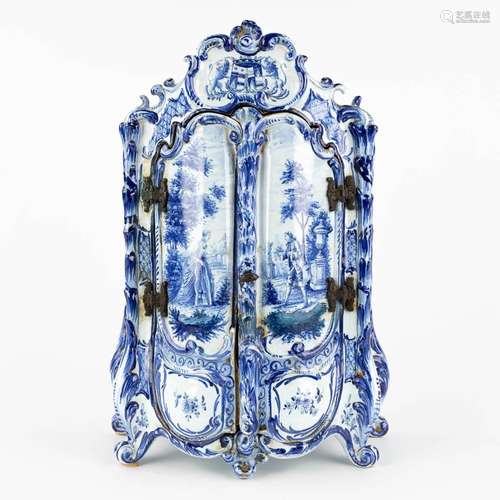 Delft, a miniature Linnen Cabinet, blue and white glazed fai...