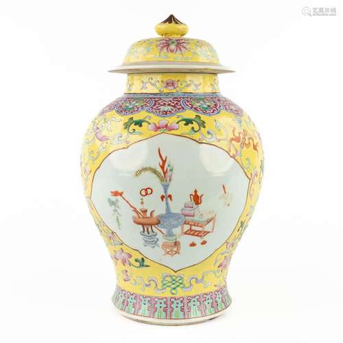 A large Chinese vase with lid, Famille Rose, decor of antiqu...