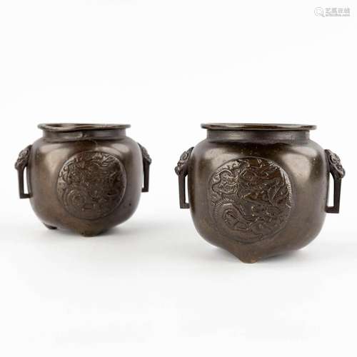 A pair of Chinese bronze brûle parfum with dragon and phoeni...