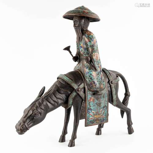 A Japanese figure of Lao Zi seated on a mule, Champslevé bro...