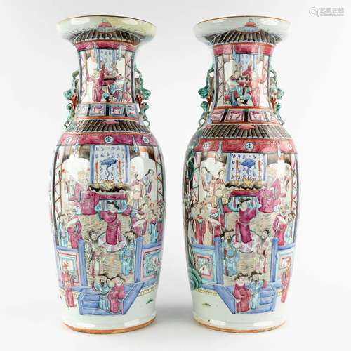 A pair of Chinese vases with Famille Rose vases with a templ...