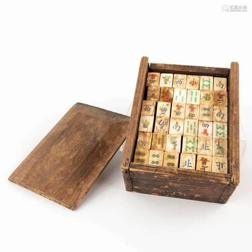 An antiuqe game 'Mahjong', bone and wood. Mounted in a chest...