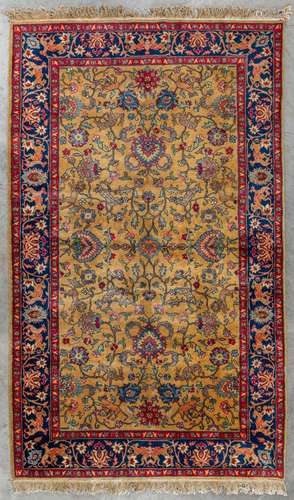 An Oriental hand-made carpet decorated with animals, Kashan....