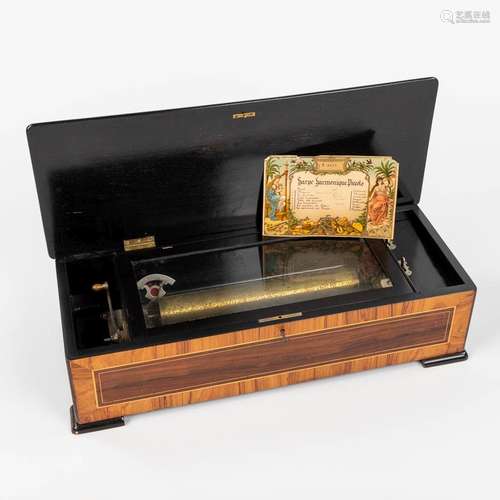 An antique music box 'Harpe Harmoniuqe Piccolo' with roll an...