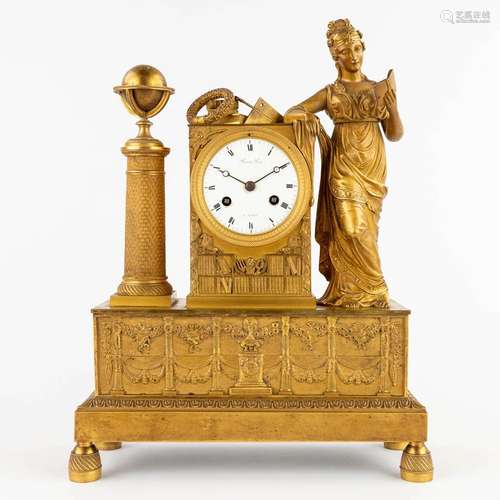 A mantle clock 'The Geographer' gilt bronze, empire. Picnot ...