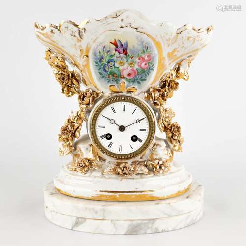 Vieux Bruxelles, a mantle clock with a hand-painted floral d...