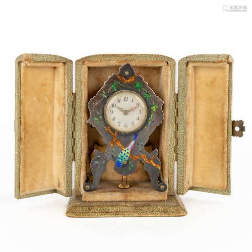 A traveller's clock, silver with hand-painted enamel. Decor ...