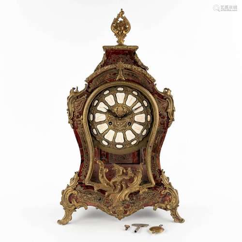 An antique mantle clock, tortoiseshell and copper inlay, ear...