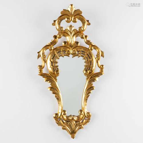 An antiqe mirror, sculptured and gilt wood, Roccoco style. C...