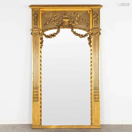 A fine and antique mirror, gilt and sculptured wood in a neo...