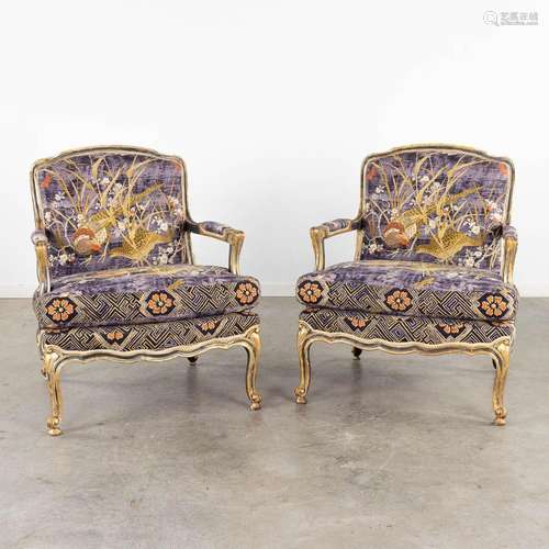 A pair of patinated Louis XV-style armchairs, fabric decorat...