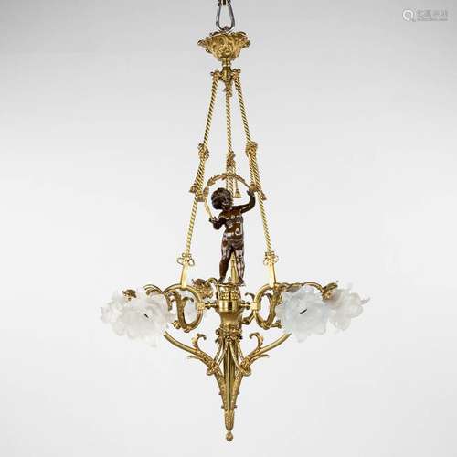 A ceiling lamp, gilt and patinated bronze, decorated with a ...