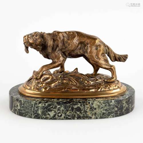 A figurine of a dog, patinated bronze on a marble base. 19th...