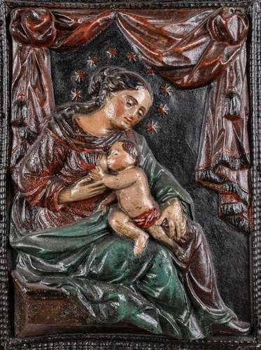 Mother with a nursing child, an image in paper maché, Probab...