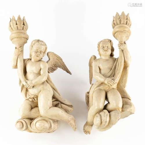 Two antique angels with candle holders, wood sculptured with...