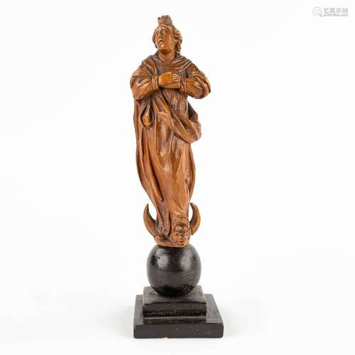 An antique wood sculptured Madonna on the crescent moon, 16t...