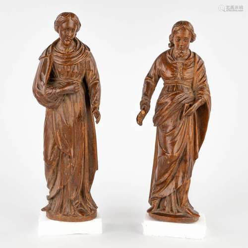 A set of two figurines of Mary and Joseph, sculptured wood, ...