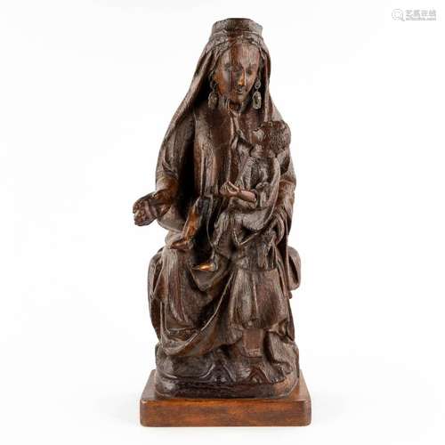 An antique wood sculpture of a mother with child, oak, 17th ...