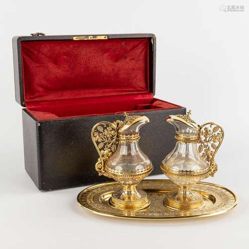 A set of wine and water cruets, gilt silver in the original ...