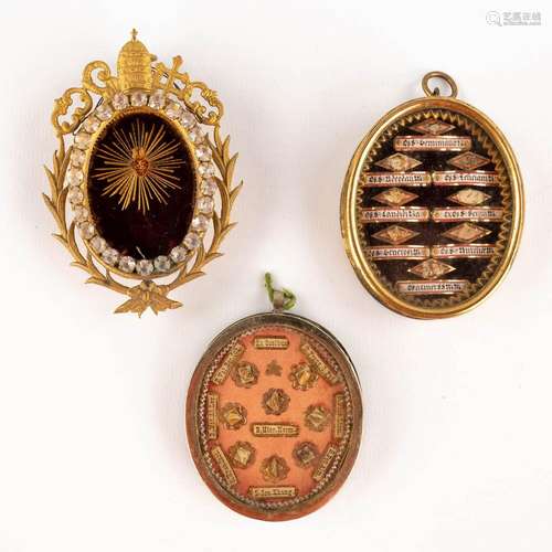 Three large and sealed theca with relics, Sacred Heart and o...