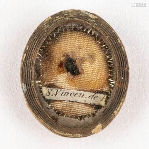 A sealed Theca with a relic and document: Ex Veste Vincentiu...