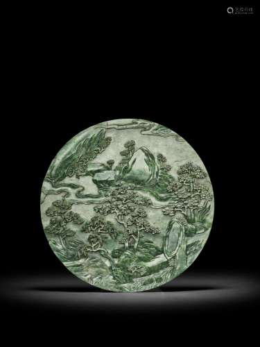 <br />
A spinach-green jade 'landscape' circular table scree...