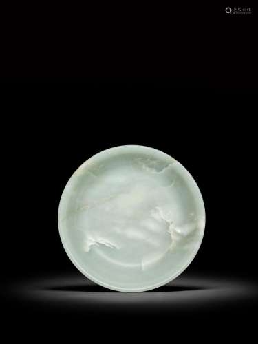 <br />
A large pale celadon jade dish, Qing dynasty, 18th ce...