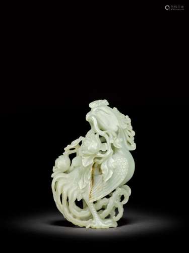 <br />
A large celadon jade 'phoenix and peony' group, Qing ...