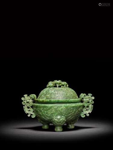 <br />
A spinach-green jade archaistic tripod incense burner...